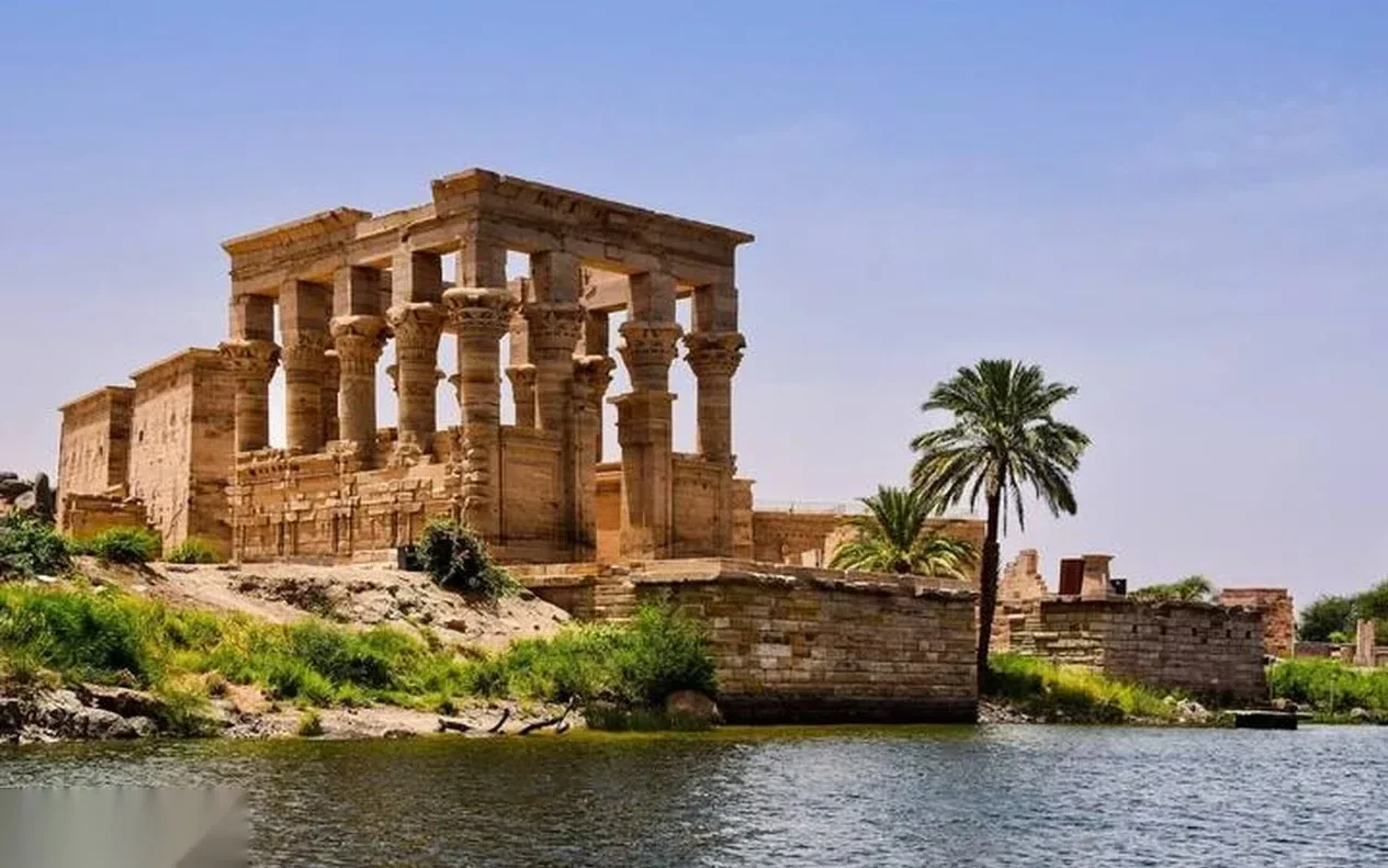 Another view of the Kiosk of Trajan at Philae Temple across the water, nearly identical to a companion photo.